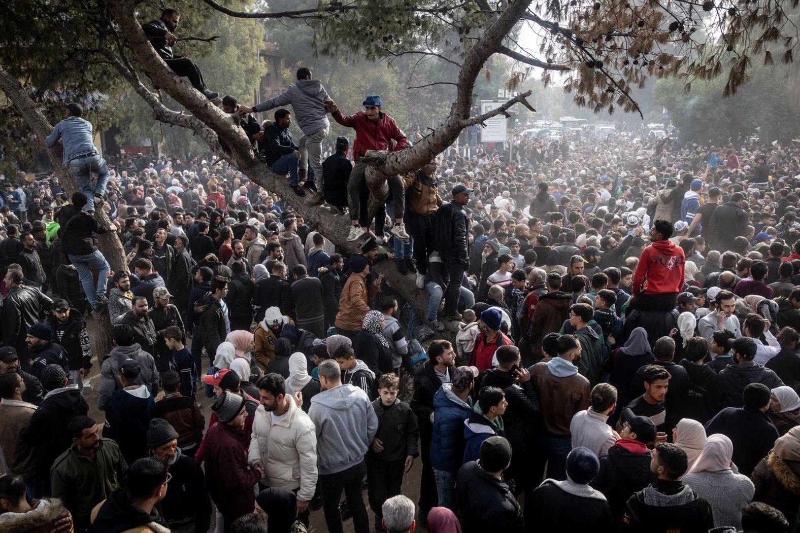 People gather in Al-Madan Square in Madaya, Syria, on December 11 to call for accountability of war crimes committed by the Syrian Armed Forces under the Assad regime.