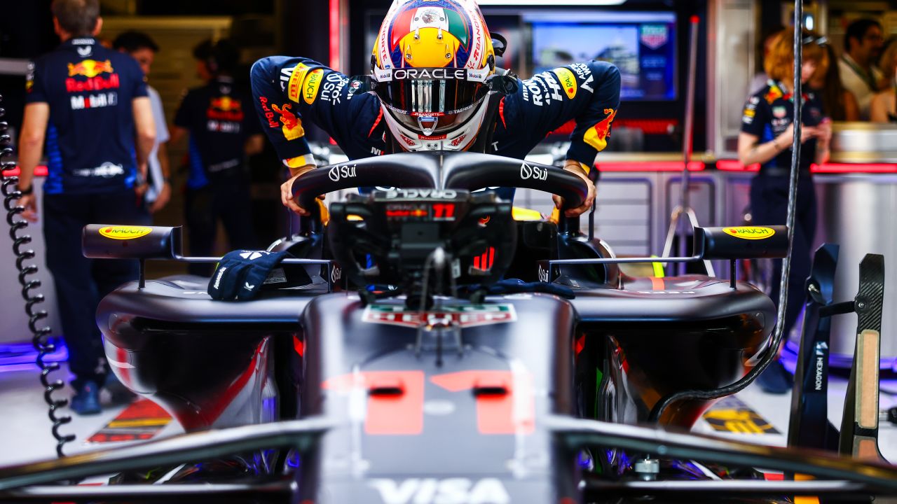 ABU DHABI, UNITED ARAB EMIRATES - DECEMBER 08: Sergio Perez of Mexico and Oracle Red Bull Racing prepares to drive in the garage prior to the F1 Grand Prix of Abu Dhabi at Yas Marina Circuit on December 08, 2024 in Abu Dhabi, United Arab Emirates. (Photo by Mark Thompson/Getty Images)