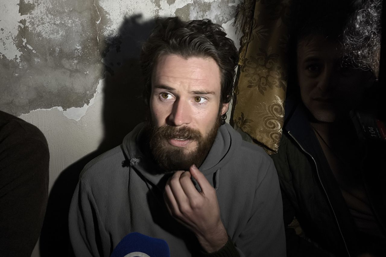 Travis Pete Timmerman, a U.S. citizen who went missing in Syria, speaks to press after being released from the Sednaya Prison in Damascus, Syria, on December 12.