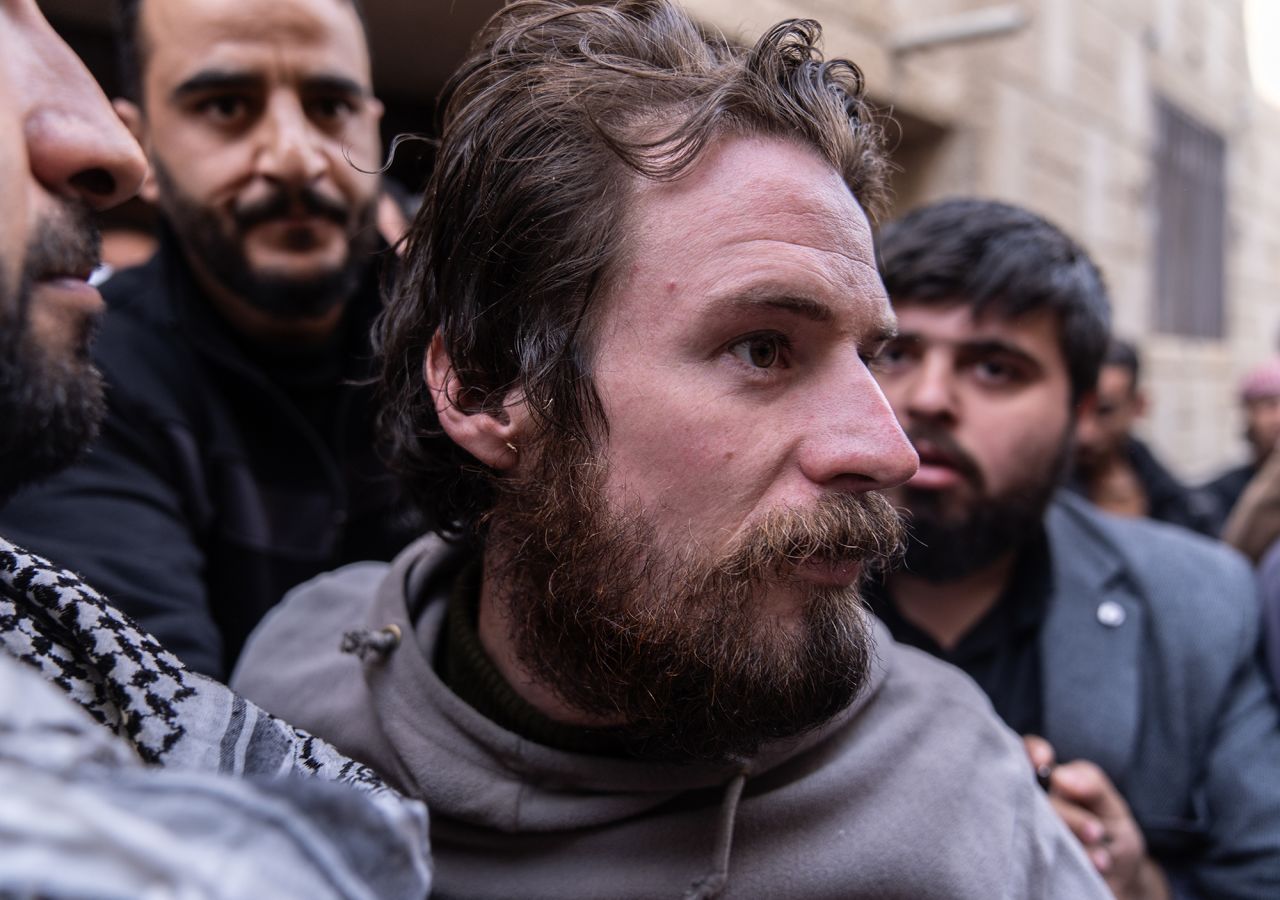 Travis Timmerman speaks to press after being found following the fall of the Assad regime in Damascus, Syria, on December 12.