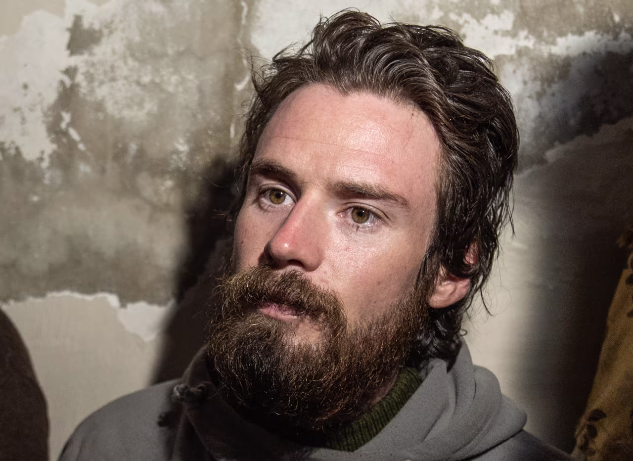 DAMASCUS, SYRIA - DECEMBER 12: Travis Pete Timmerman, a U.S. citizen who went missing in Syria, speaks to press after being found following the fall of the Assad regime in Damascus, Syria on December 12, 2024. (Photo by Emin Sansar/Anadolu via Getty Images)