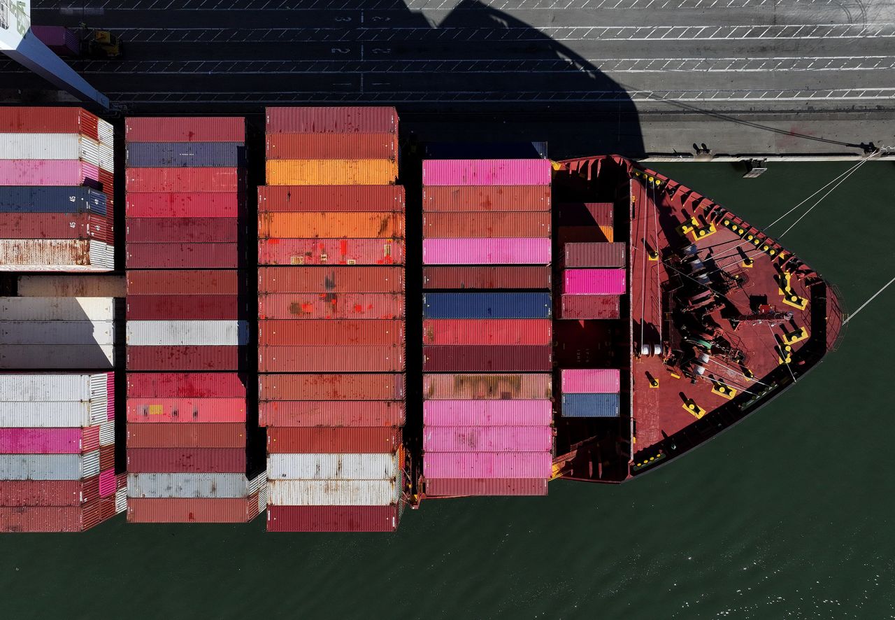 In an aerial view, a container ship sits docked at the Port of Oakland on December 9, 2024 in Oakland, California.