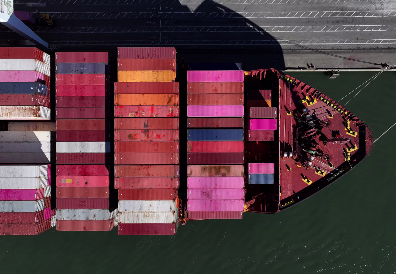 A container ship sits docked at the Port of Oakland, California, on December 9. U.S. President-elect Donald Trump is threatening new tariffs on multiple countries as his second term approaches, after making tariffs a signature of his 2024 Presidential campaign.