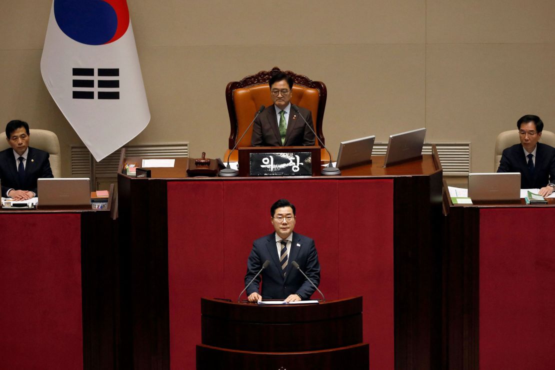 Park Chan-dae, floor leader of the Democratic Party, speaks during the plenary session for the impeachment vote at the National Assembly in Seoul on December 14