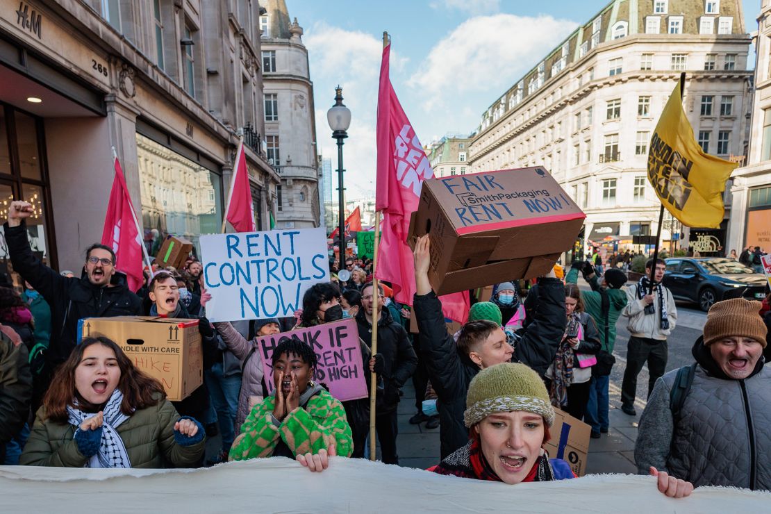 Supporters of the London Renters Union, a campaign group for renters' rights, march through London in December 2024 to demand rent controls across Britain.