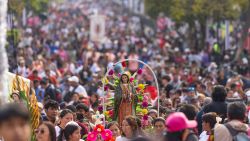 MEXICO CITY, MEXICO - DECEMBER 11: Pilgrims gather around the entrance to the Basilica of Guadalupe on December 11, 2024 in Mexico City, Mexico. Every December 12th, Mexicans celebrate the anniversary of the day when the Virgin Mary is said to have appeared to an indigenous man, Juan Diego, in 1531. Celebrations include pilgrimages to the Basilica that start several days before and involve thousands of faithful. (Photo by Hector Vivas/Getty Images)