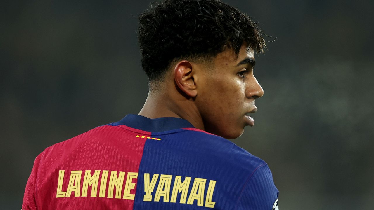 DORTMUND, GERMANY - DECEMBER 11: Lamine Yamal of FC Barcelona looks on during the UEFA Champions League 2024/25 League Phase MD2 match between Borussia Dortmund and FC Barcelona at BVB Stadion Dortmund on December 11, 2024 in Dortmund, Germany. (Photo by Lars Baron/Getty Images)