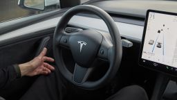 A Tesla Model Y equipped with Tesla's "Autopilot" feature. Federal safety regulators are looking at whether or not Tesla is complying with rules to promptly report accidents involving its autonomous driving technology.