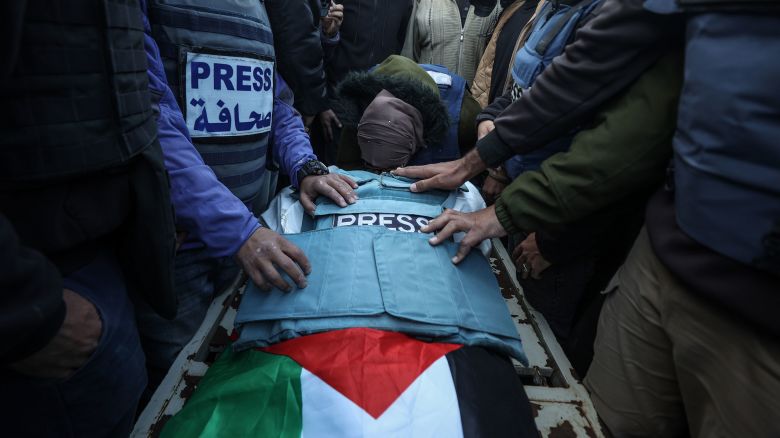 GAZA CITY, GAZA - DECEMBER 16: A funeral ceremony of Al Jazeera TV cameraman Ahmed El-Levh, who killed in Israeli attack on Nuseirat Refugee Camp, held by his relatives and colleagues in Gaza Strip, Gaza on December 16, 2024. (Photo by Ali Jadallah/Anadolu via Getty Images)