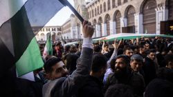 DAMASCUS, SYRIA - DECEMBER 13: People erupt in celebration after performing the first Friday prayer since the fall of the Assad regime at the Umayyad Mosque on December 13, 2024 in Damascus, Syria. Rebel forces in Syria have retaken the capital from longtime ruler Bashar al-Assad, who has fled the country for Moscow. The fall of the Assad regime marks a new chapter for Syria, which has been mired in a multi-party civil war since 2011, sparked by the Arab Spring uprisings. (Photo by Chris McGrath/Getty Images)