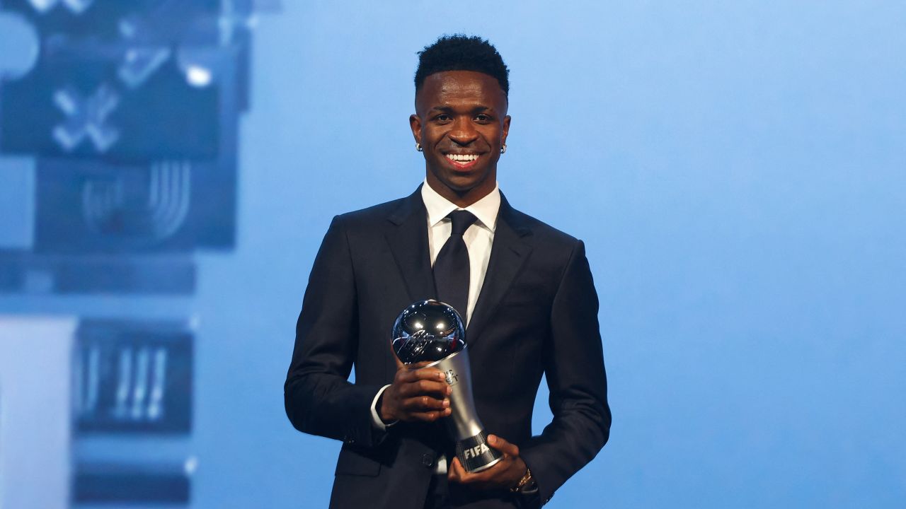 Brazilian forward Vinicius Junior poses with the Best Player trophy during the Best FIFA Football Awards 2024 ceremony in Doha on December 17, 2024. (Photo by Karim JAAFAR / AFP) (Photo by KARIM JAAFAR/AFP via Getty Images)