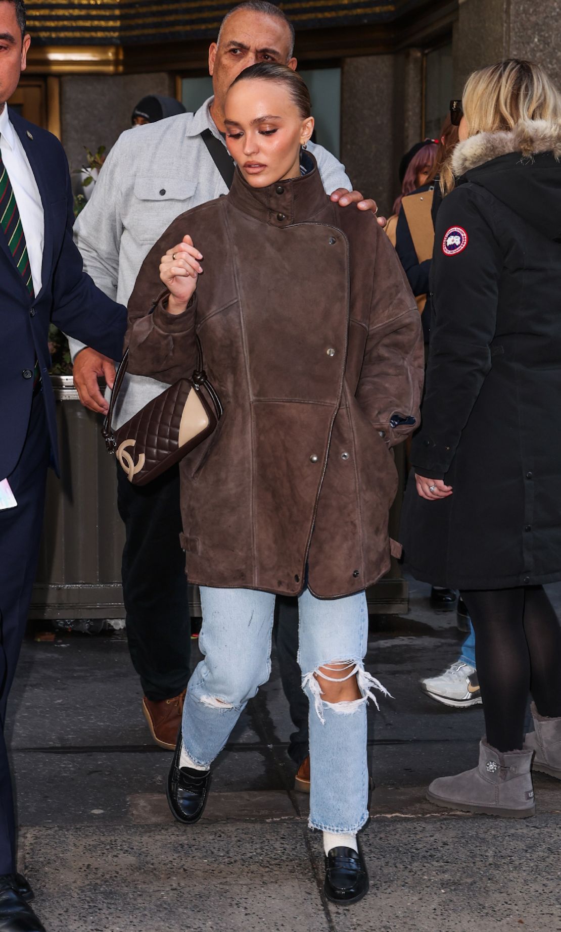 Lily-Rose Depp was spotted in a chocolate suede coat while leaving the 'Kelly Clarkson Show' in New York in December.