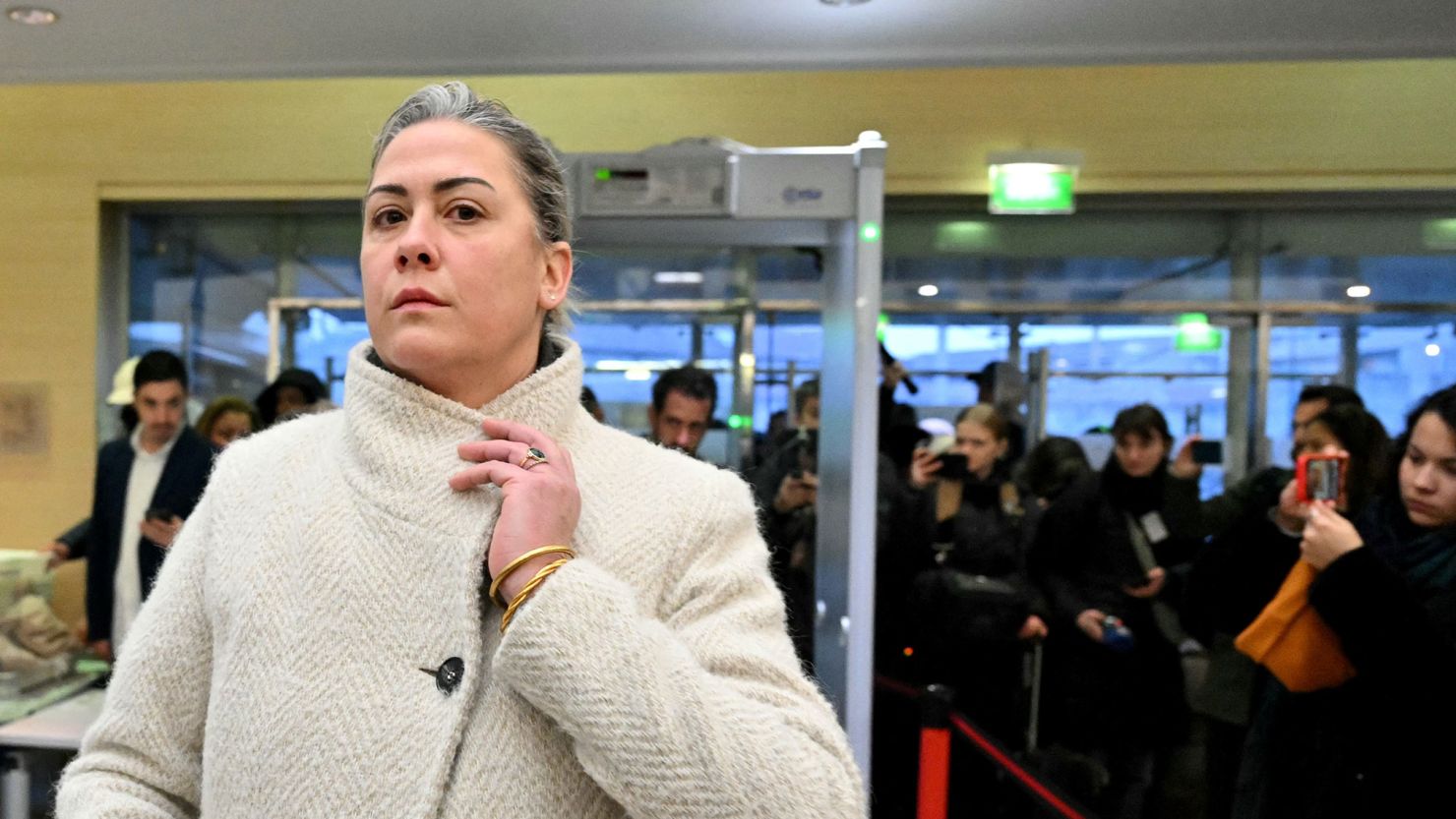 Caroline Darian passes through security check as she arrives at the courthouse in Avignon, France, on December 19.