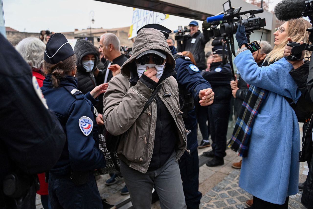 One of the defendants arrives at the courthouse on December 19.