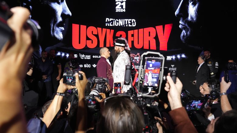 Oleksandr Usyk (left) and Tyson Fury face off during a press conference in Riyadh, Saudi Arabia. Picture date: Thursday December 19, 2024. (Photo by Nick Potts/PA Images via Getty Images)