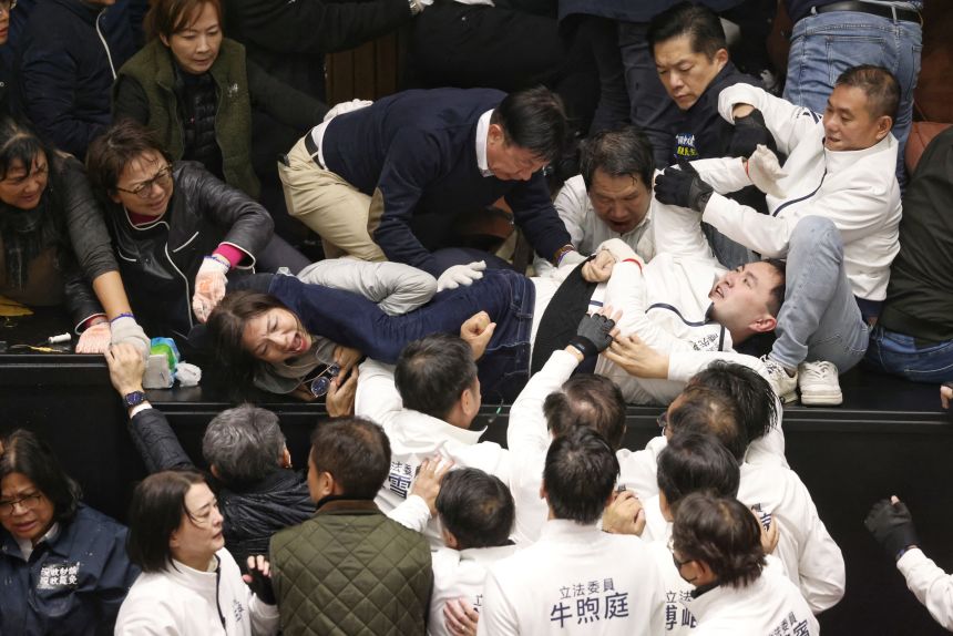 Lawmakers in Taiwan's brawl over legislation in the Legislative Yuan in Taipei on December 20, 2024.
