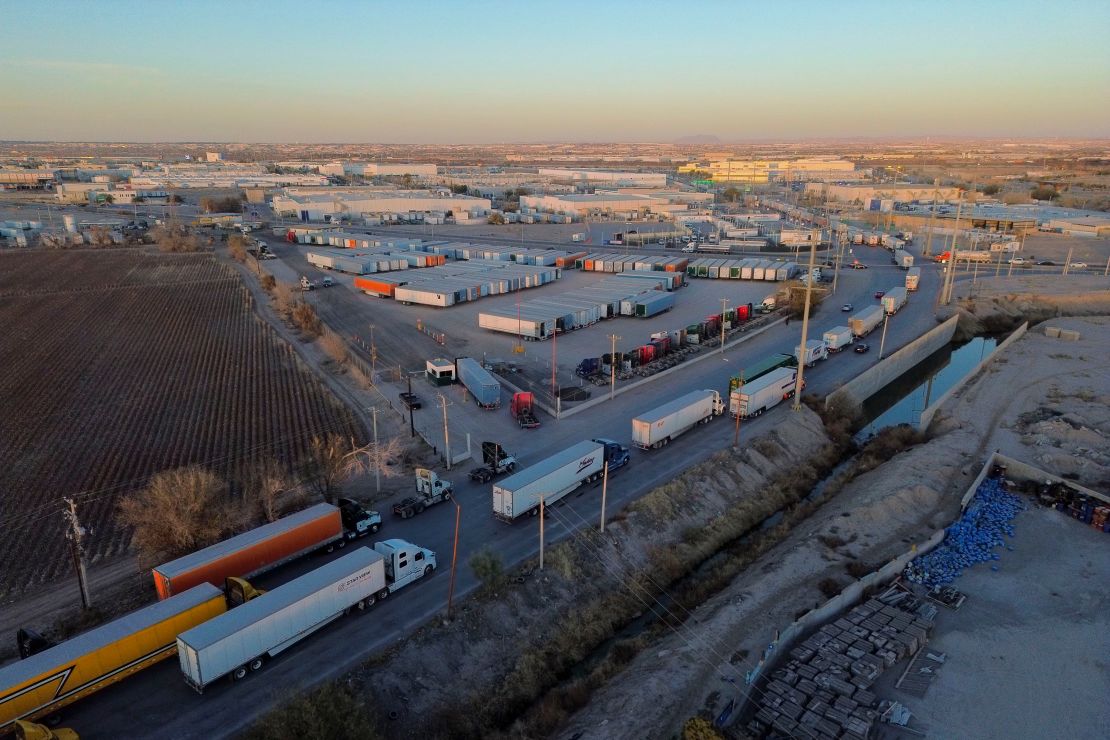 Tractor trailers wait in line at the Ysleta-Zaragoza International Bridge port of entry on the US-Mexico border in Juarez, Chihuahua state, Mexico, on December 20, 2024.