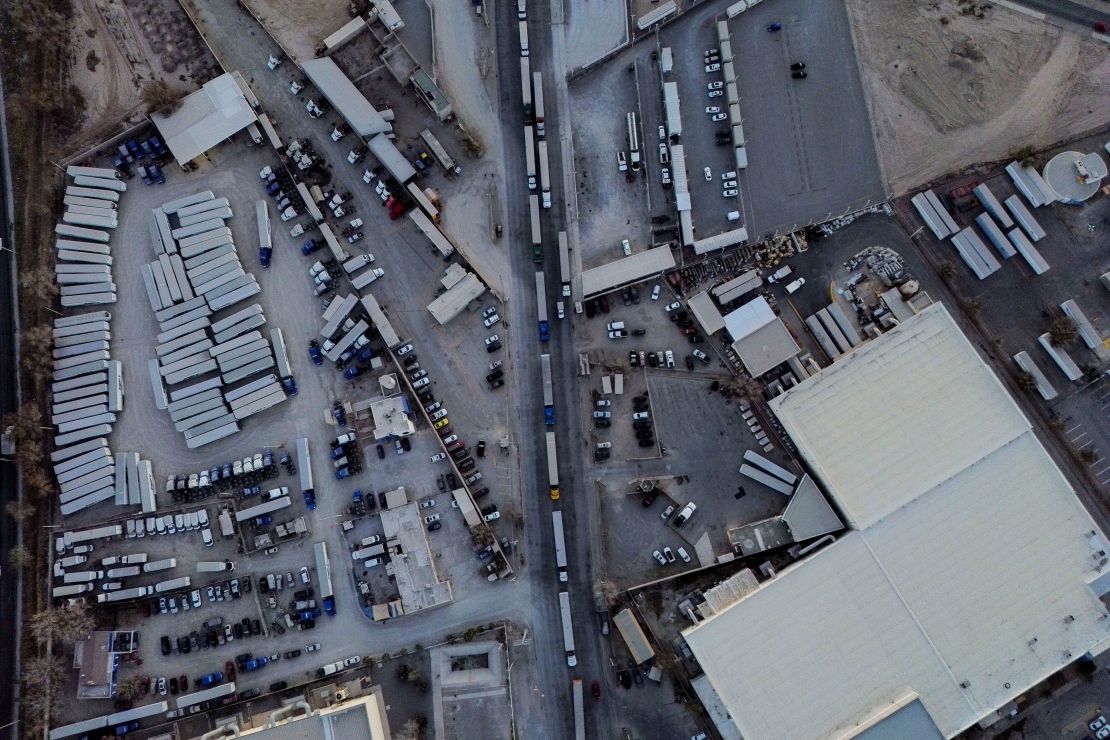 Tractor trailers wait in line at the Ysleta-Zaragoza International Bridge port of entry on the US-Mexico border in Juarez, Chihuahua state, Mexico, on December 20, 2024.