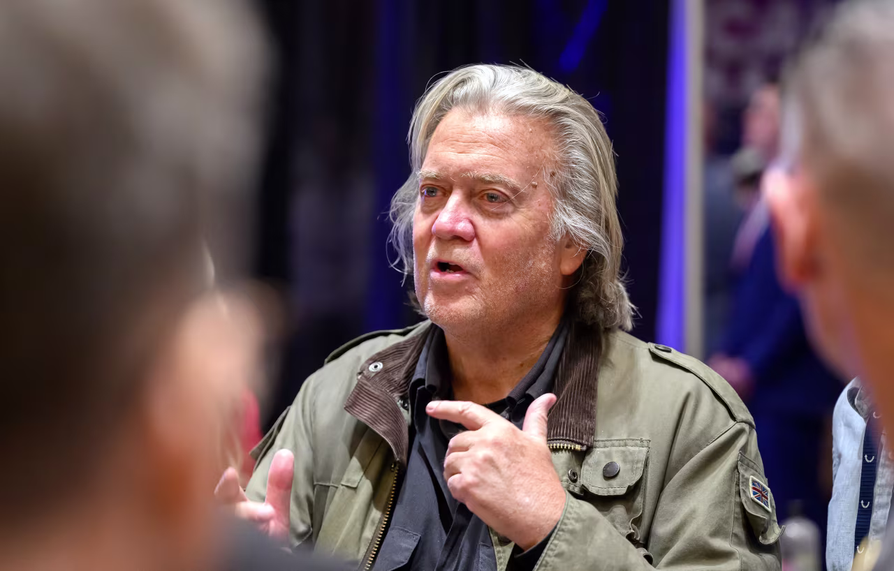 Steve Bannon speaks with at Turning Point's AmericaFest in Phoenix in December.