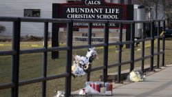 MADISON, WISCONSIN - DECEMBER 17: A makeshift memorial sits in front of Abundant Life Christian School as police continue to investigate yesterday's shooting on December 17, 2024 in Madison, Wisconsin. Multiple people were reported shot and at least three have died after a student opened fire in the school. (Photo by Scott Olson/Getty Images)