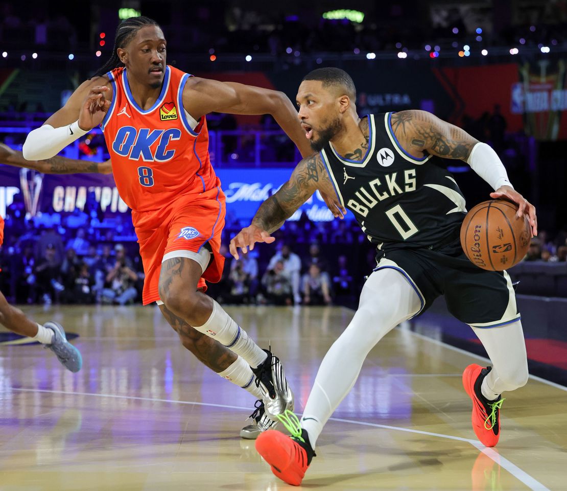 Milwaukee Bucks guard Damian Lillard drives against the Thunder.