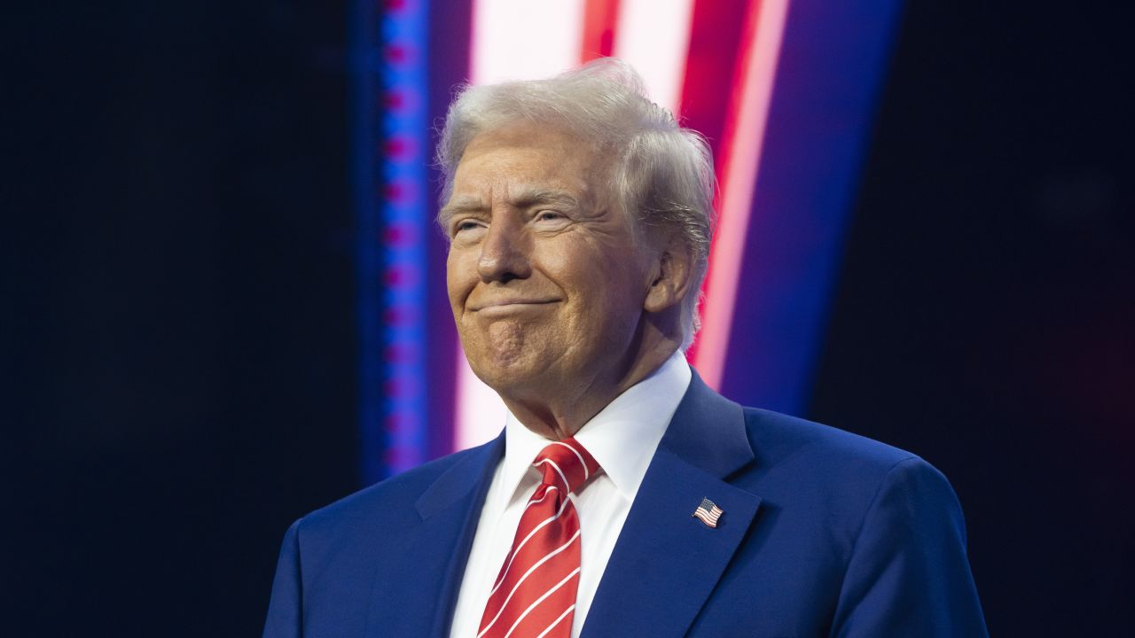 PHOENIX, ARIZONA - DECEMBER 22: U.S. President-elect Donald Trump smiles during Turning Point USA's AmericaFest at the Phoenix Convention Center on December 22, 2024 in Phoenix, Arizona. The annual four day conference geared toward energizing and connecting conservative youth hosts some of the country's leading conservative politicians and activists. (Photo by Rebecca Noble/Getty Images)