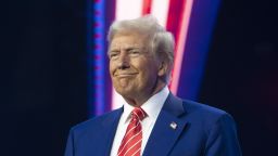 PHOENIX, ARIZONA - DECEMBER 22: U.S. President-elect Donald Trump smiles during Turning Point USA's AmericaFest at the Phoenix Convention Center on December 22, 2024 in Phoenix, Arizona. The annual four day conference geared toward energizing and connecting conservative youth hosts some of the country's leading conservative politicians and activists. (Photo by Rebecca Noble/Getty Images)