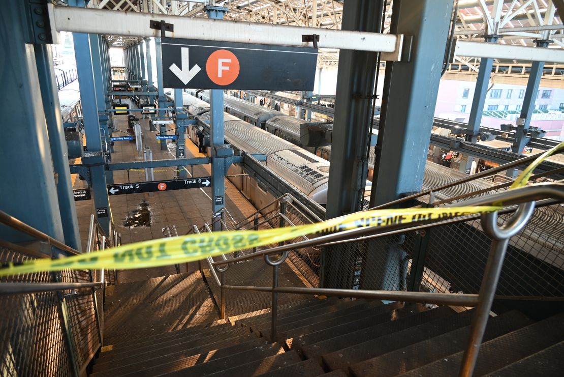 Police investigate at the Coney Island-Stillwell Avenue Station in Brooklyn after a woman aboard a subway car was set on fire and died in New York on December 22, 2024.