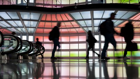 Travelers at O'Hare International Airport (ORD) in Chicago, Illinois, US, on Monday, Dec. 23, 2024. The Transportation Security Administration (TSA) anticipates screening 40 million passengers this holiday season. Photographer: Vincent Alban/Bloomberg via Getty Images