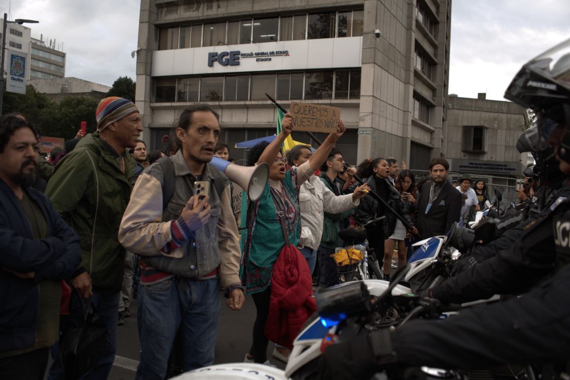 Citizens from several provinces gather in front of the Attorney General's office to demand the safe return of children from Las Malvinas, in Guayaquil, Quito, Ecuador on December 23, 2024.