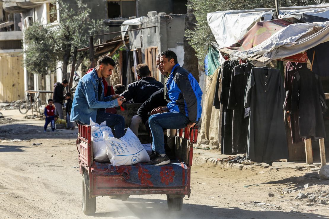 Flour is distributed in Khan Yunis by the UN agency for Palestinian refugees, or UNRWA, in Khan Younis, Gaza on December 24.