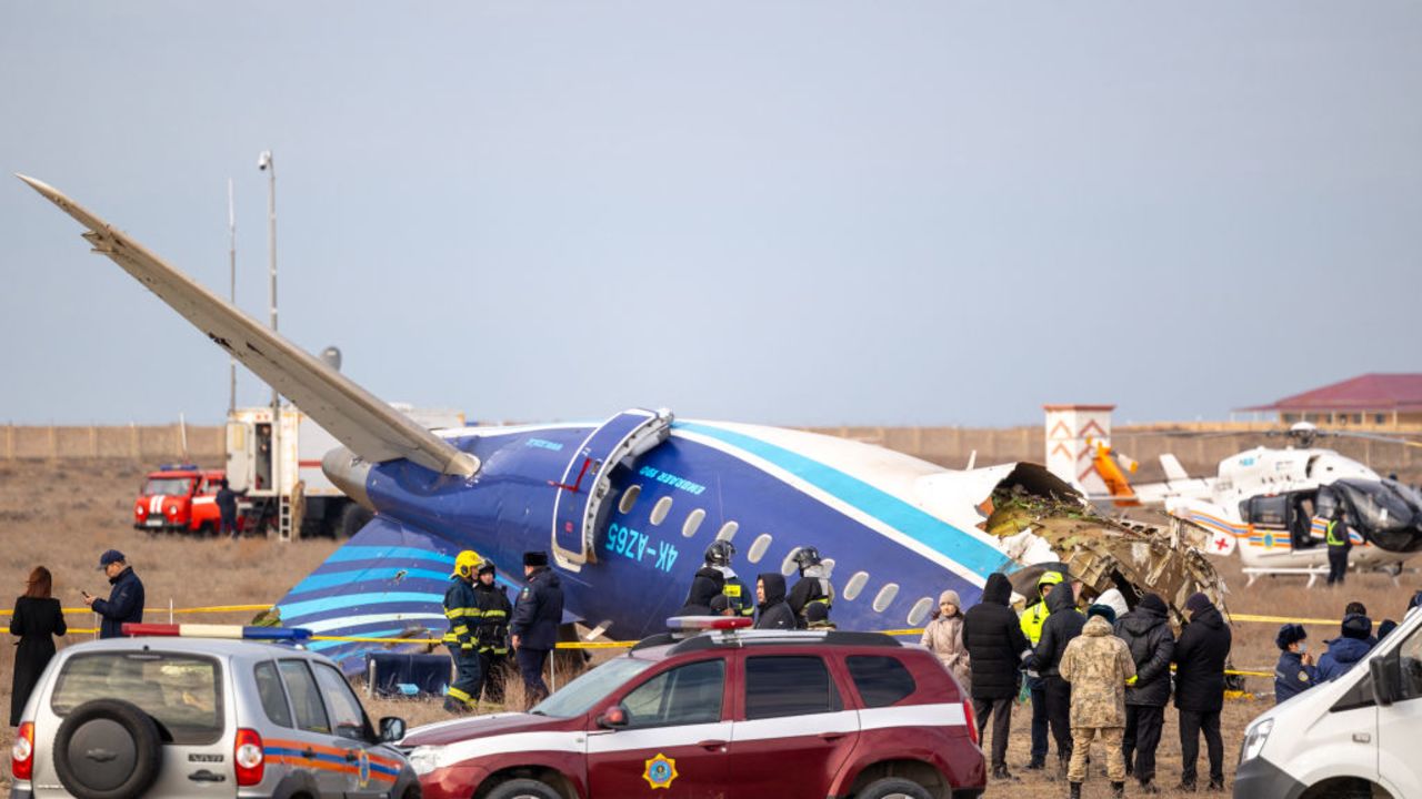 Emergency specialists work at the crash site of an Azerbaijan Airlines passenger jet near the western Kazakh city of Aktau on December 25, 2024. (Photo by Issa Tazhenbayev / AFP) (Photo by ISSA TAZHENBAYEV/AFP via Getty Images)