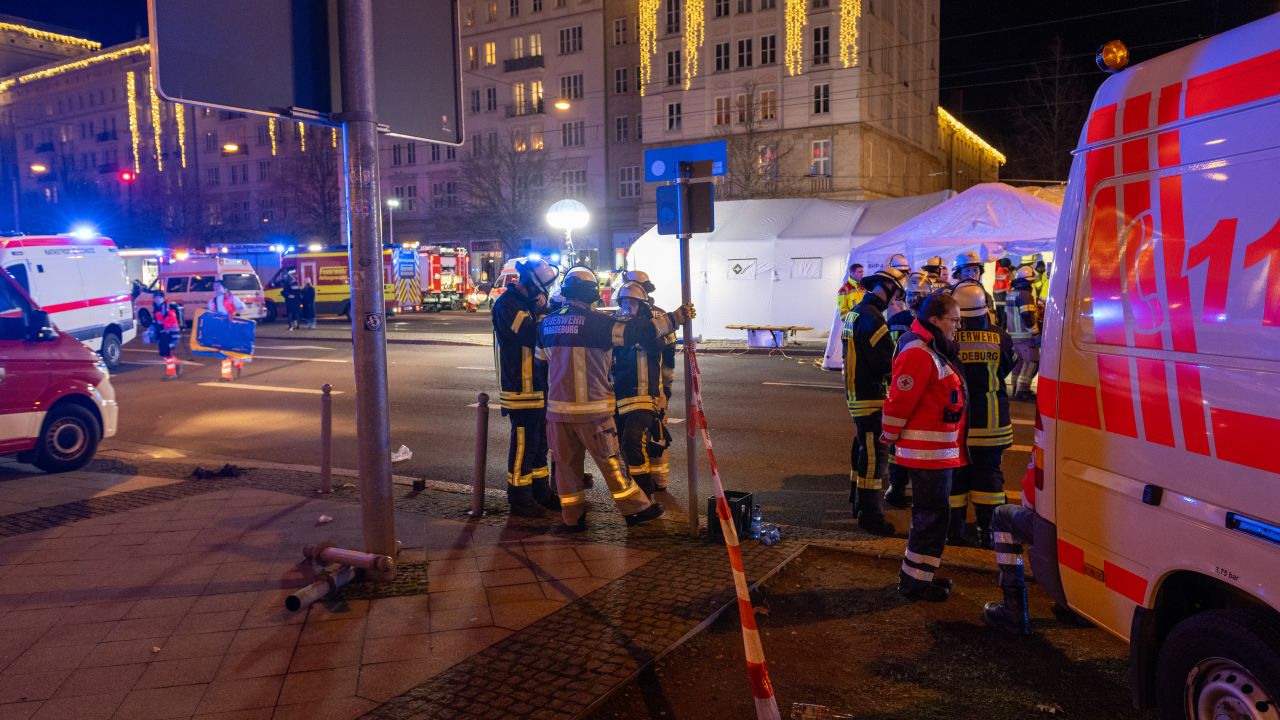 MAGDEBURG, GERMANY - DECEMBER 20: Police vans and ambulances stand next to the annual Christmas market in the city center following a possible terror incident on December 20, 2024 in Magdeburg, Germany. According to initial reports at least one person is dead and dozens injured after a car drove into the crowded Christmas market. Police reportedly arrested the driver. (Photo by Craig Stennett/Getty Images)