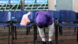 A Guatemalan migrant deported from the United States waits at the Returnee Reception Center upon arrival at the Guatemalan Air Force Base in Guatemala City on December 27, 2024, during the last deportee flight of the year. Guatemala closes 2024 with more than 61,000 deported from the US. (Photo by JOHAN ORDONEZ / AFP) (Photo by JOHAN ORDONEZ/AFP via Getty Images)