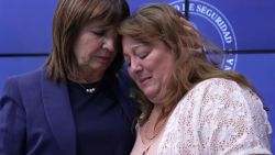 Griselda Heredia (R), mother of Nahuel Agustin Gallo, a member of the Argentine Gendarmerie detained in Venezuela, is comforted by Argentina's Security Minister Patricia Bullrich during a press conference in Buenos Aires on December 27, 2024. An Argentine policeman arrested in Venezuela will be charged with "terrorism," the country's prosecutor said on Friday, hiking tensions between Caracas and Buenos Aires. Venezuelan chief prosecutor Tarek William Saab said in a statement that Gallo was being investigated for allegedly belonging to "a group of people who attempted to carry out a series of destabilizing and terrorist actions from our territory and with the support of international far-right groups." (Photo by MAGALI CERVANTES / AFP) (Photo by MAGALI CERVANTES/AFP via Getty Images)