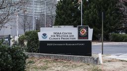Signage outside the National Oceanic and Atmospheric Administration (NOAA) Center for Weather and Climate Prediction headquarters in College Park, Maryland, US, on Thursday, Dec. 5, 2024. The conservative Project 2025 roadmap calls for slashing NOAA funding at a time when China is investing heavily in climate research. Photographer: Michael A. McCoy/Bloomberg via Getty Images