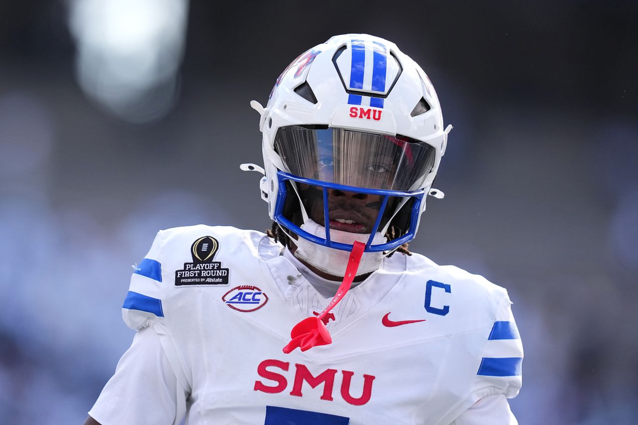 STATE COLLEGE, PENNSYLVANIA - DECEMBER 21: Kevin Jennings #7 of the Southern Methodist Mustangs warms up prior to a game against the Penn State Nittany Lions in the Playoff First Round Game at Beaver Stadium on December 21, 2024 in State College, Pennsylvania. (Photo by Mitchell Leff/Getty Images)