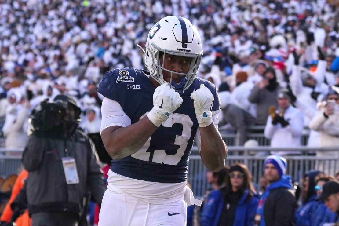 STATE COLLEGE, PENNSYLVANIA - DECEMBER 21: Kaytron Allen #13 of the Penn State Nittany Lions celebrates after running the ball for a touchdown during the second quarter against the Southern Methodist Mustangs in the Playoff First Round Game at Beaver Stadium on December 21, 2024 in State College, Pennsylvania. (Photo by Mitchell Leff/Getty Images)