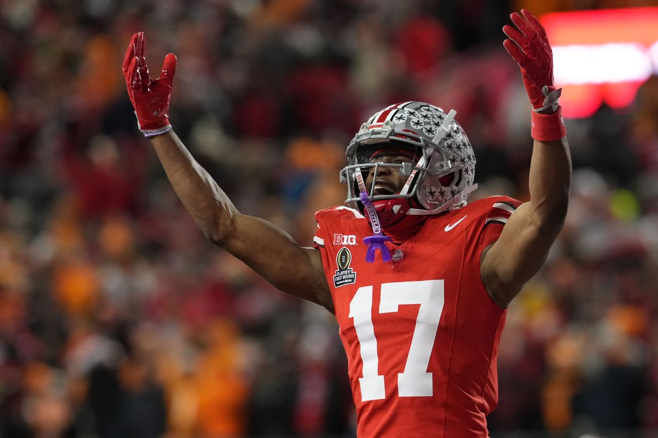 Ohio State wide receiver Carnell Tate celebrates after a teammate scored a touchdown in the first quarter.