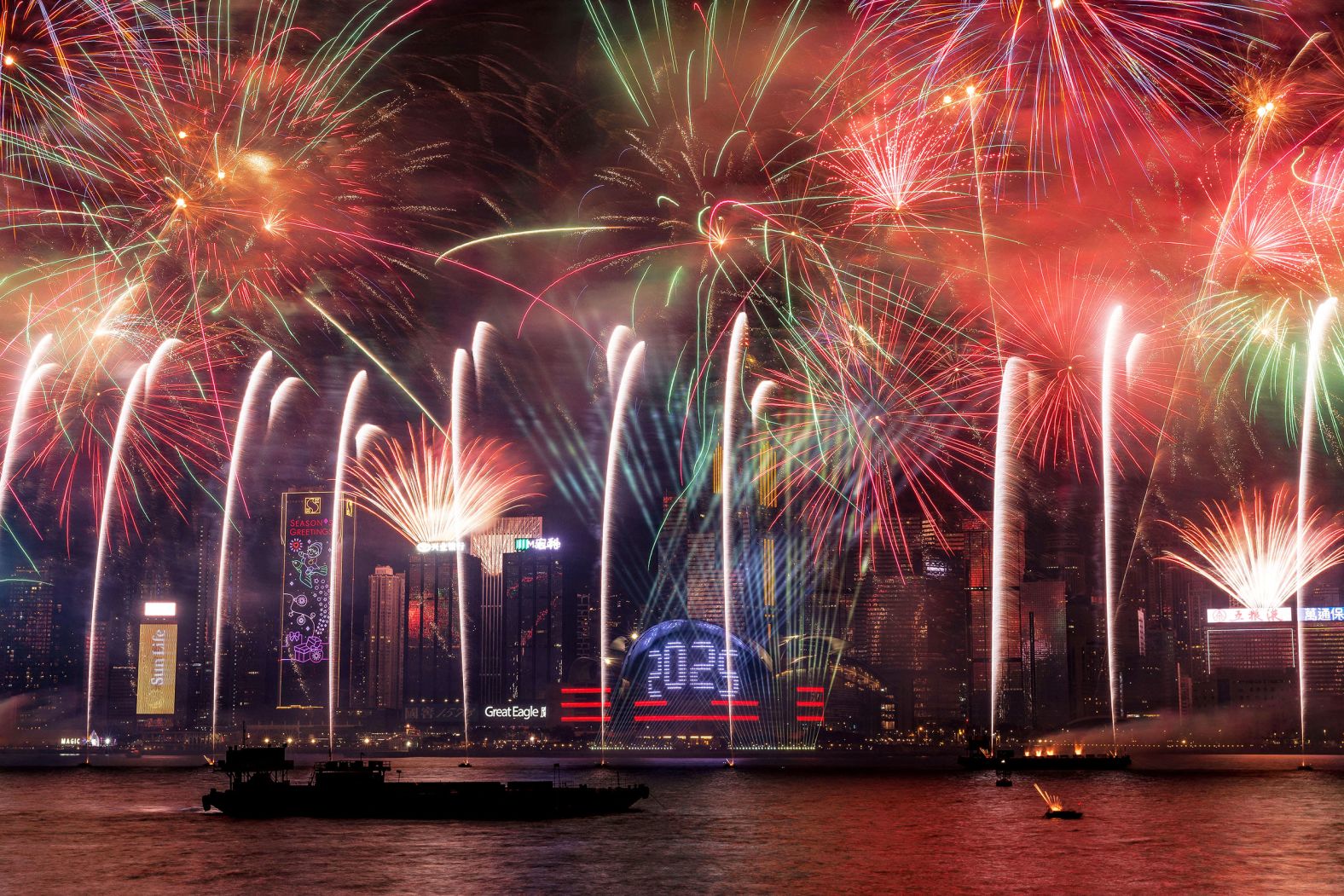 Fireworks light up the midnight sky over Victoria Harbour in Hong Kong.