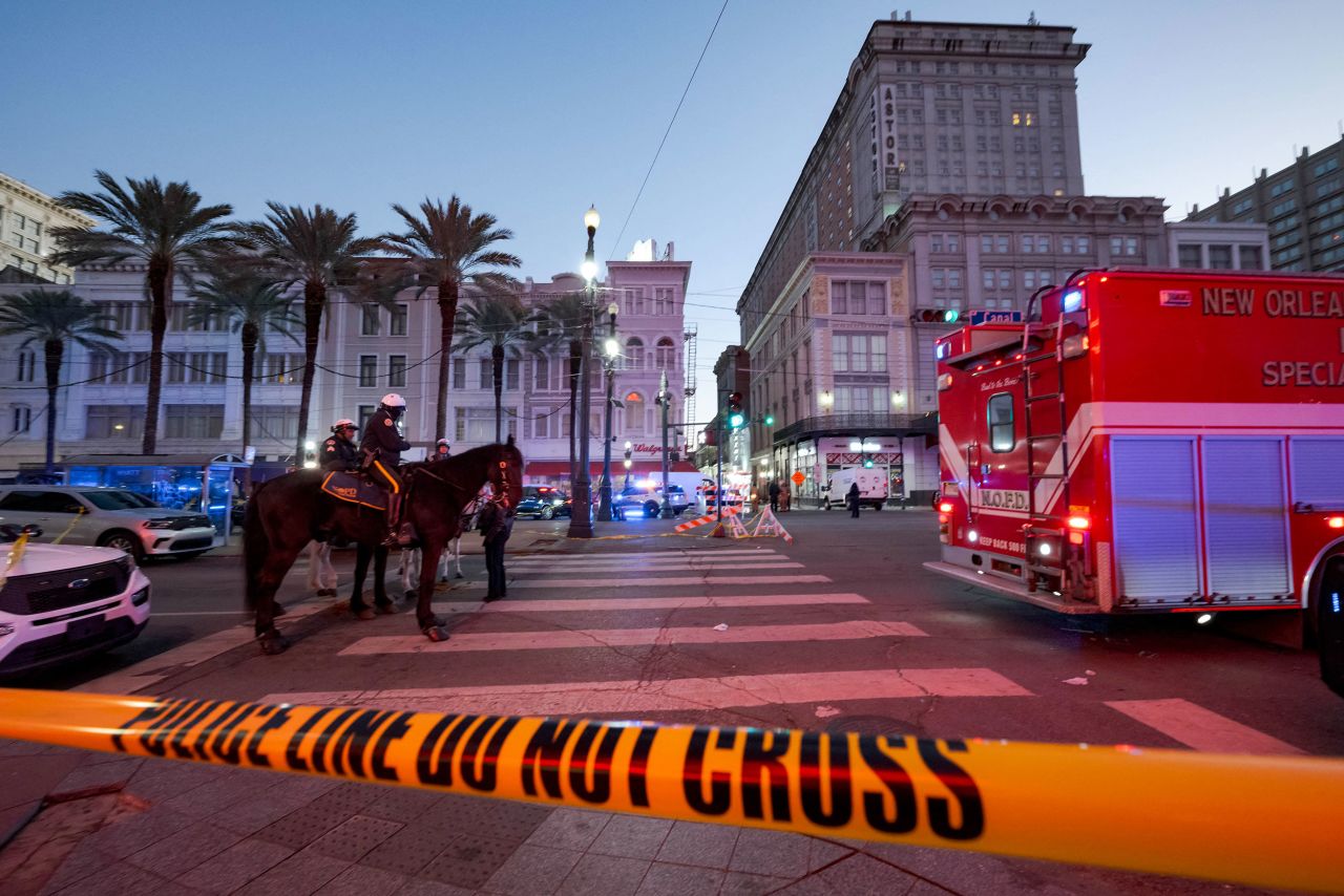 Police cordon off the intersection of Canal and Bourbon Street in the French Quarter of New Orleans, Louisiana, on January 1.