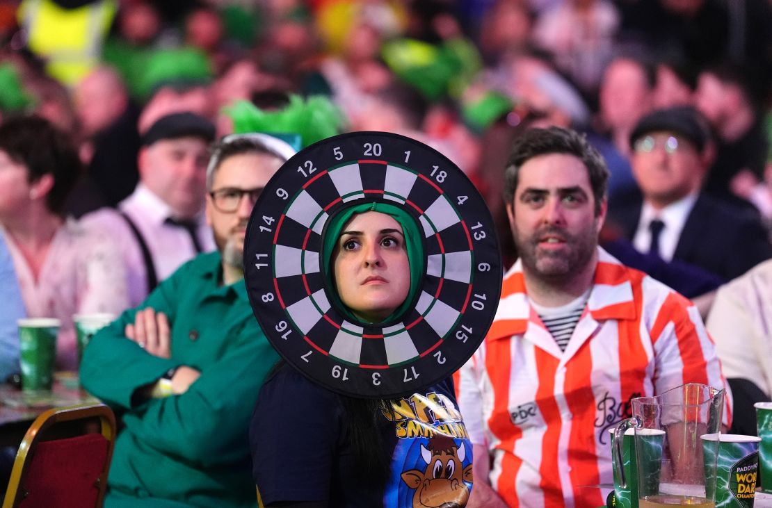 Spectators watch the quarter-final match between Peter Wright and Stephen Bunting during day fourteen of the Paddy Power World Darts Championship at Alexandra Palace, London. Picture date: Wednesday January 1, 2025. (Photo by Zac Goodwin/PA Images via Getty Images)