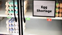 Egg shortage signage is displayed on partially empty shelves at a Sprouts Farmer's Market grocery store in Lawndale, California on January 2, 2025. Bird flu and other factors have contributed to an egg shortage in California. (Photo by Patrick T. Fallon / AFP) (Photo by PATRICK T. FALLON/AFP via Getty Images)