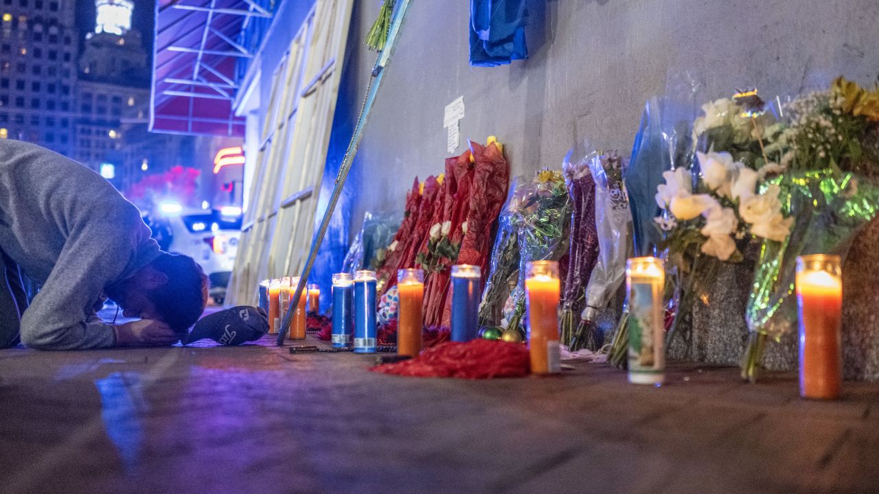 TOPSHOT - A man reacts as he prays at a memorial on Bourbon Street after it reopened to the public on January 2, 2025, in New Orleans, Louisiana, following an attack on January 1 which left 14 dead. A US army veteran loyal to the Islamic State jihadist group likely acted alone when he killed 14 and injured dozens in a truck attack on a crowd of New Year revelers in New Orleans, the FBI said on January 2. (Photo by ANDREW CABALLERO-REYNOLDS / AFP) (Photo by ANDREW CABALLERO-REYNOLDS/AFP via Getty Images)