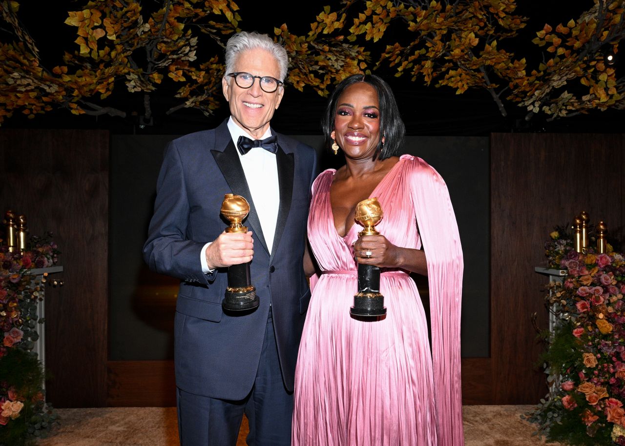 Ted Danson and Viola Davis hold their awards at the Golden Gala on January 3, 2025 in Beverly Hills, California.