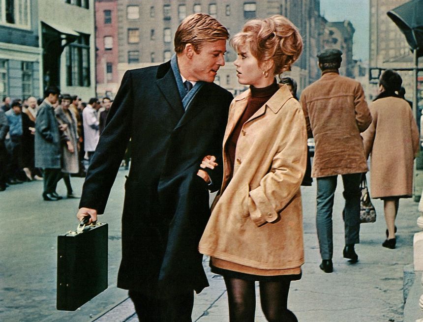 Robert Redford and Jane Fonda walking arm in arm on a Manhattan street from the 1967 film 