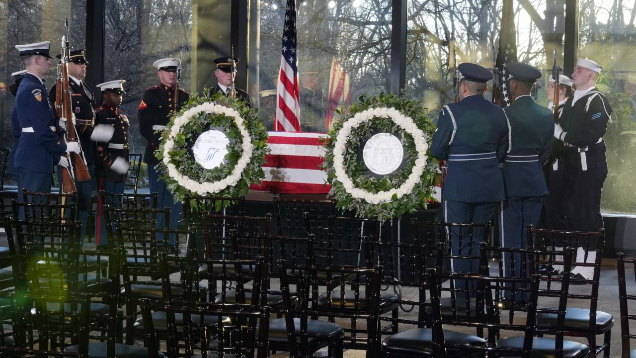 TThe Guard of Honor stands at the flag-draped casket of former President Jimmy Carter as he lies in repose at the Jimmy Carter Presidential Library and Museum in Atlanta, Georgia, on January 4, 2025. Carter, the 39th President of the United States, died at the age of 100 on December 29, 2024 at his home in Plains, Georgia. (Photo by Alex Brandon / POOL / AFP) (Photo by ALEX BRANDON/POOL/AFP via Getty Images)