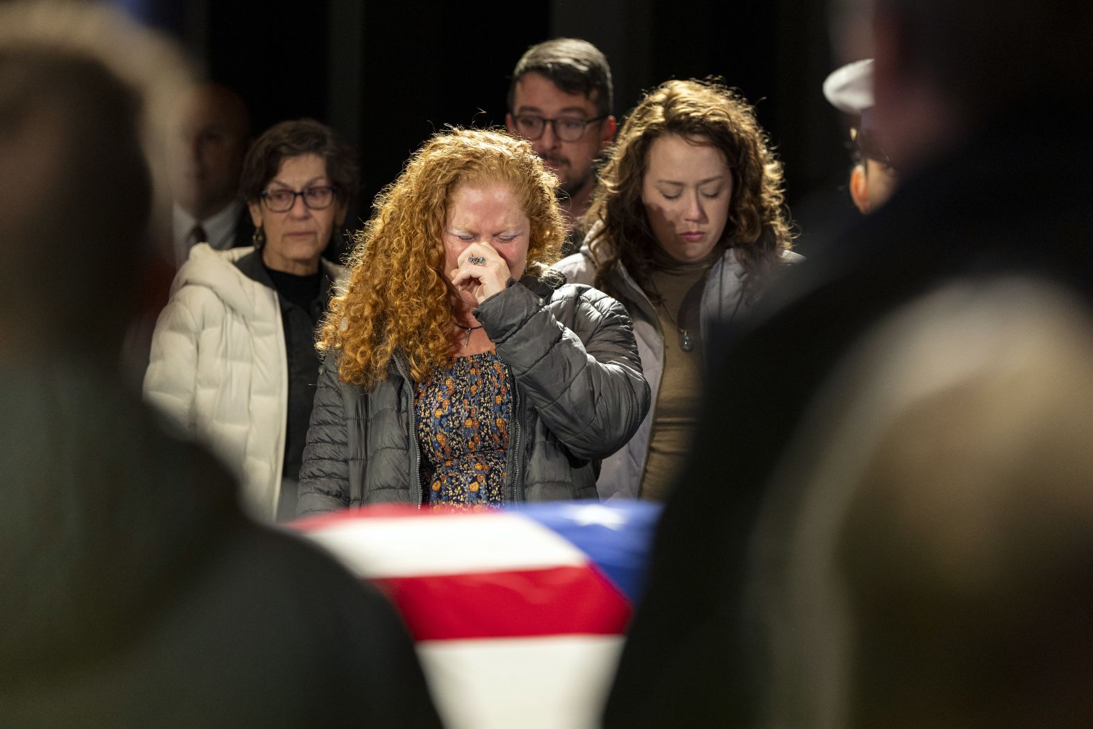 Mourners view Carter's casket as he lies in repose in Atlanta on Sunday, January 5.