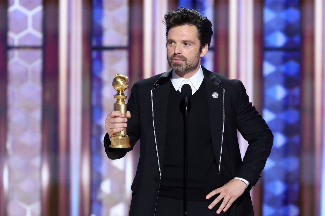 Sebastian Stan accepts the Golden Globe award for his role in "A Different Man."