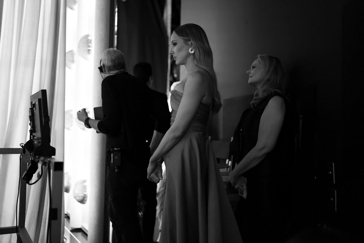 Host Nikki Glaser waits backstage.